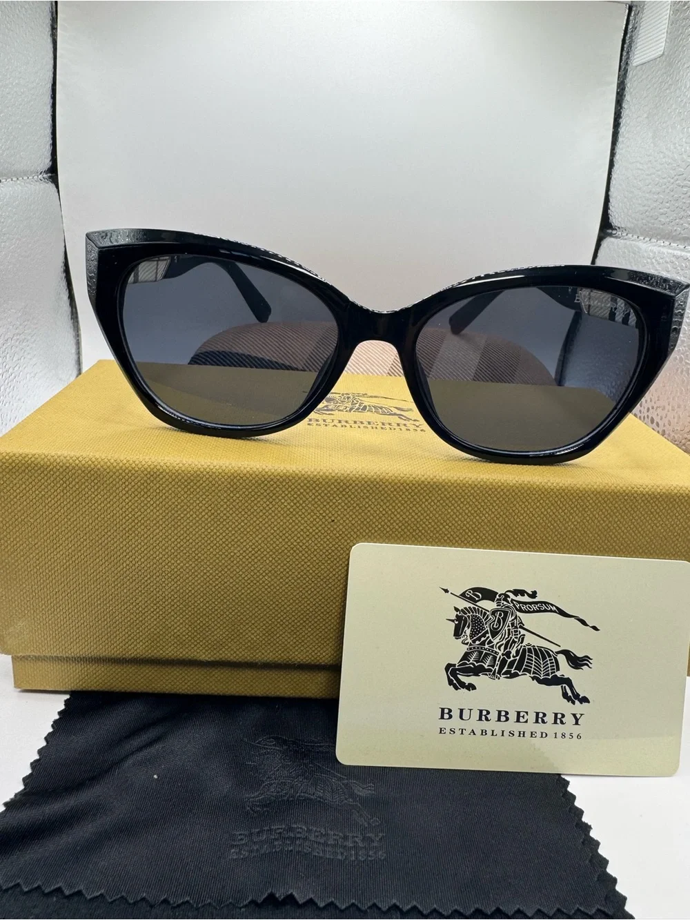 Burberry Black Cat-Eye Sunglasses with Beige Check Arms and Gold Accents